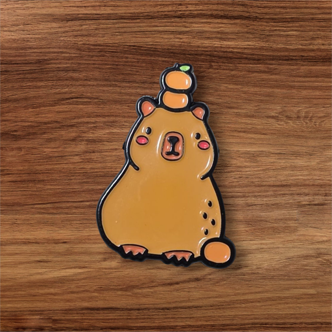 Capibara con naranjas