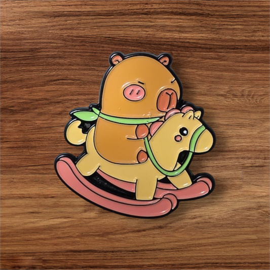 Capibara con su caballito